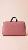 Quilted travel and storage bag, black, front view, for cosmetics or toiletries, image 4 of 13.