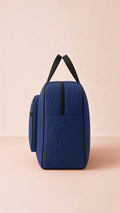 Signature Quilted Travel Bag with multiple compartments, fourth image. Organizer for essentials.