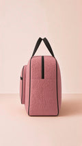 Quilted travel bag, cream, open with storage pockets, ideal for organization. Image 3 of 13.