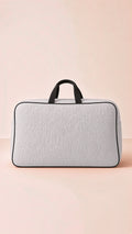 Lightweight quilted storage travel bag, versatile and compact, shown from a side view.