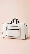 Signature quilted storage bag, travel organizer tote. Durable, stylish, perfect for essentials. Product image 1 of 13.