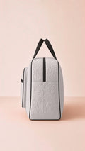 Quilted storage travel bag, lightweight & versatile, for organized packing. Image 3 of 13.